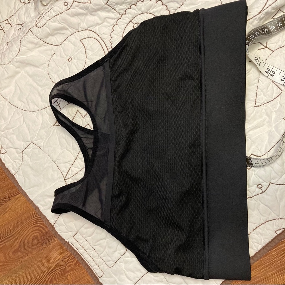 New Balance sports bra in black.